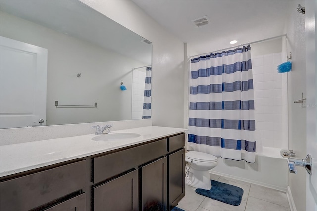 full bathroom featuring tile patterned flooring, vanity, shower / tub combo with curtain, and toilet