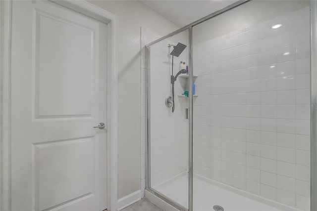 bathroom with an enclosed shower