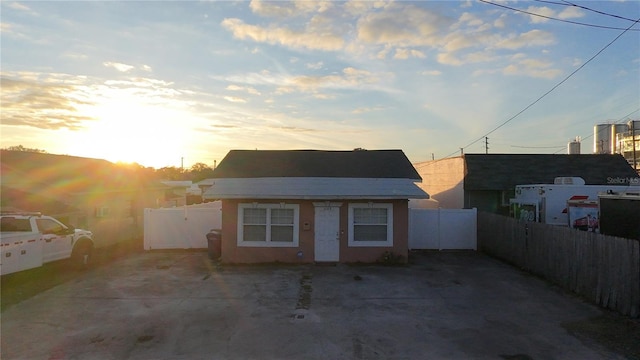 view of front facade with a patio area