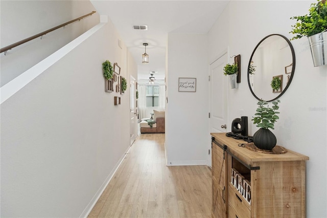 hall featuring light wood-type flooring