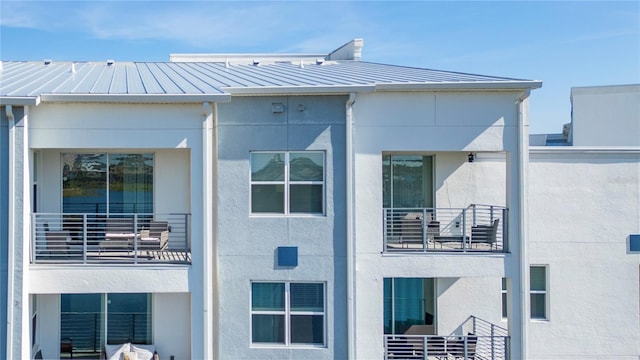 exterior space with a balcony