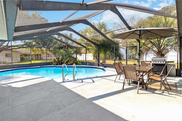 view of swimming pool with a patio and glass enclosure