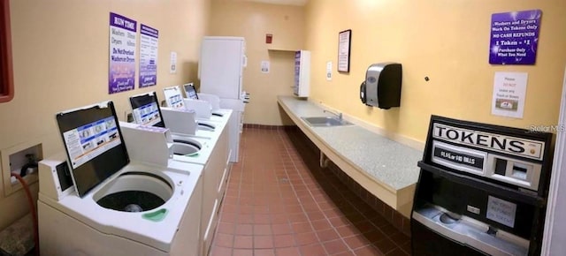 interior space with washer / clothes dryer and sink