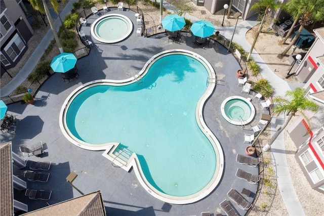 view of pool featuring a community hot tub