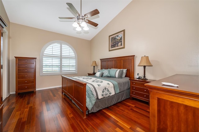 bedroom featuring lofted ceiling, dark wood-type flooring, and ceiling fan