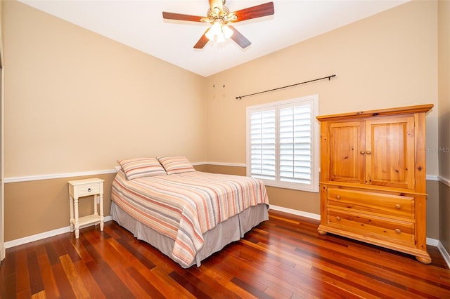 bedroom featuring dark wood-type flooring and ceiling fan