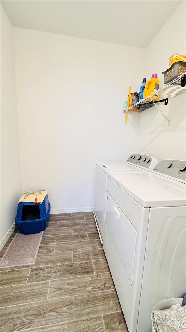 laundry area with washing machine and dryer