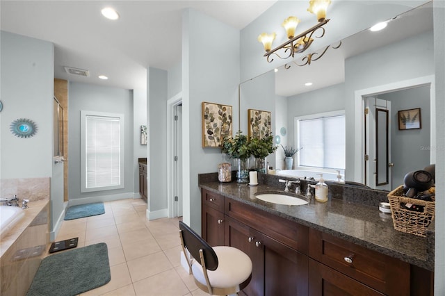 bathroom featuring a stall shower, visible vents, tile patterned floors, vanity, and a bath