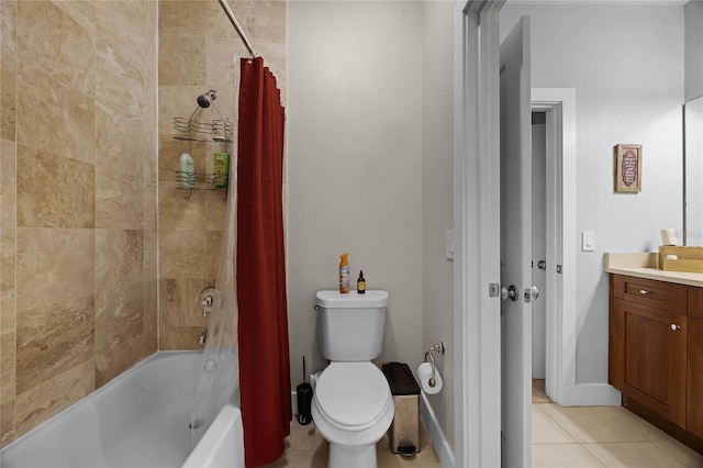 full bathroom featuring toilet, shower / bath combo, vanity, tile patterned flooring, and baseboards