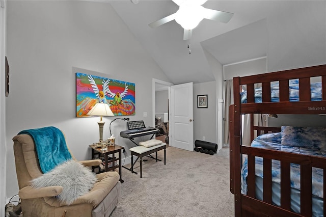 carpeted bedroom featuring ceiling fan and vaulted ceiling