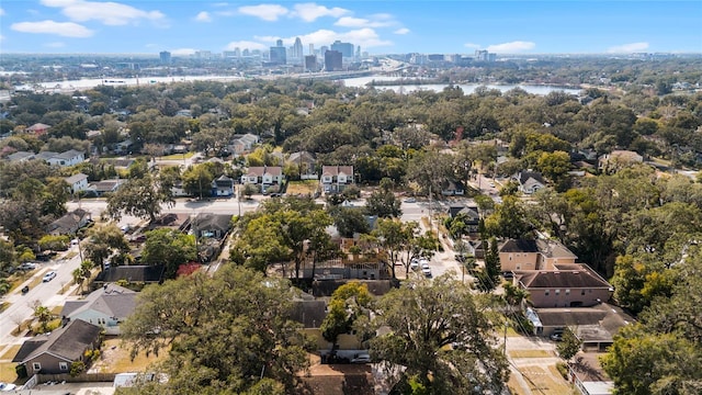 aerial view featuring a city view and a water view