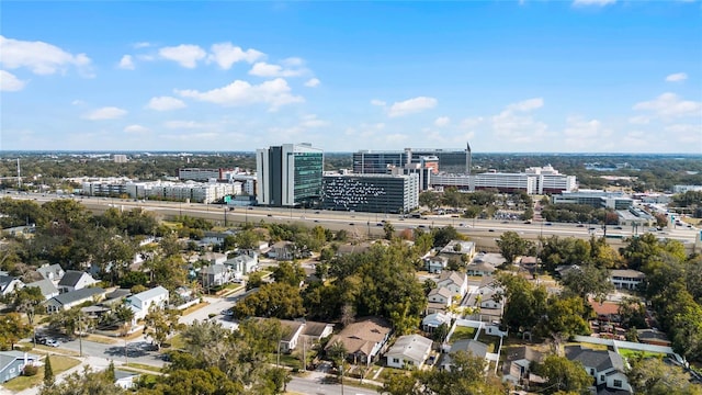 birds eye view of property featuring a city view