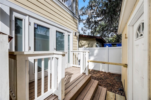 view of property exterior featuring fence