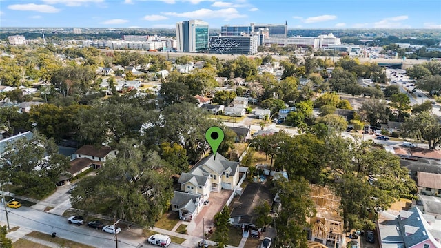 birds eye view of property featuring a view of city and a residential view