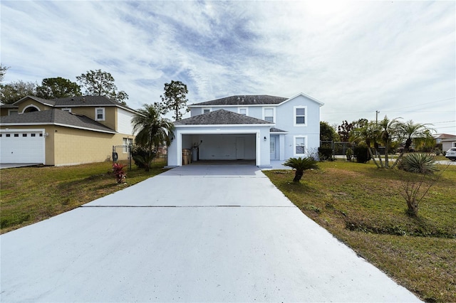 view of front facade featuring a garage and a front lawn