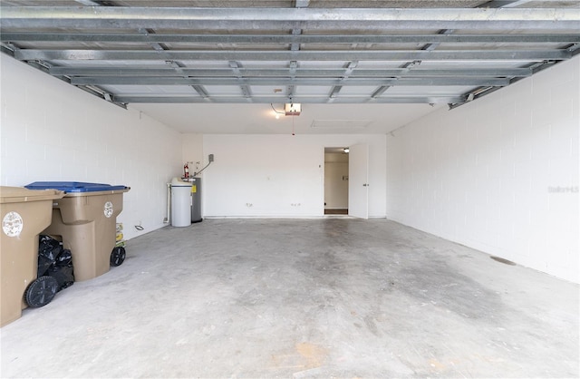 garage featuring water heater