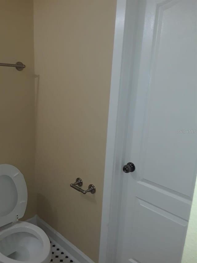 bathroom featuring toilet