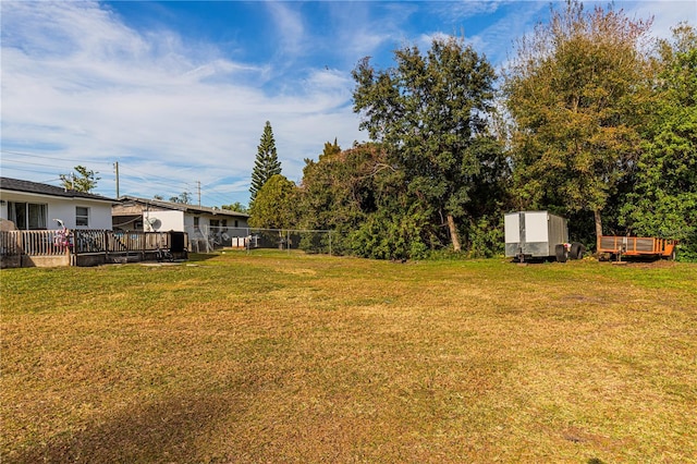 view of yard with a deck