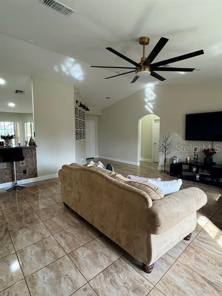 living room featuring ceiling fan