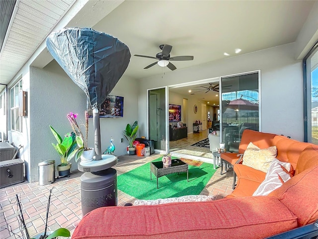 view of patio / terrace featuring an outdoor hangout area and ceiling fan