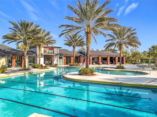 view of swimming pool featuring a patio