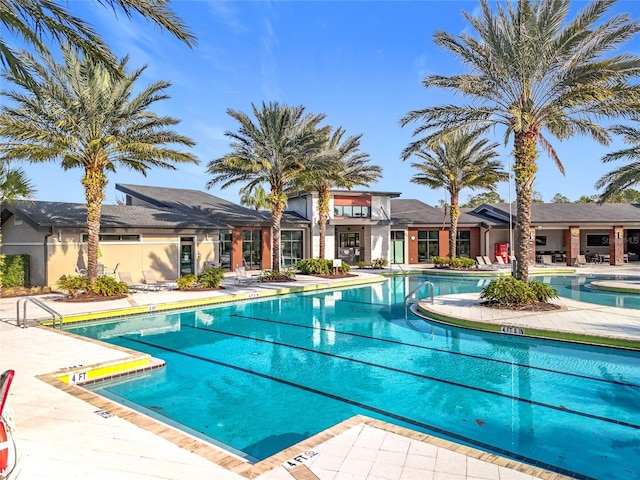 view of swimming pool featuring a patio area