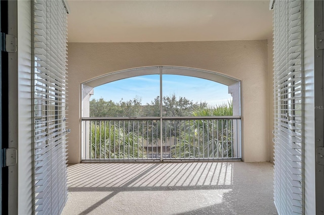 unfurnished sunroom with a healthy amount of sunlight