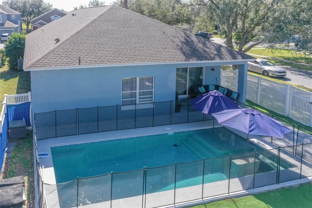 view of swimming pool featuring a patio area