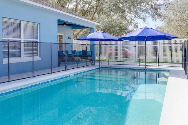 view of pool with ceiling fan