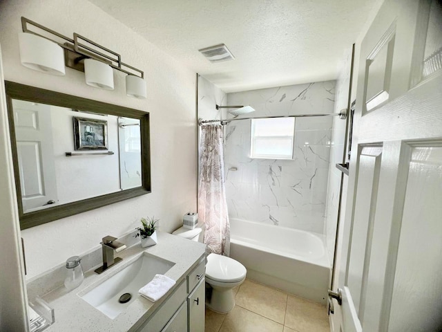 full bathroom with shower / tub combo with curtain, toilet, a textured ceiling, vanity, and tile patterned flooring