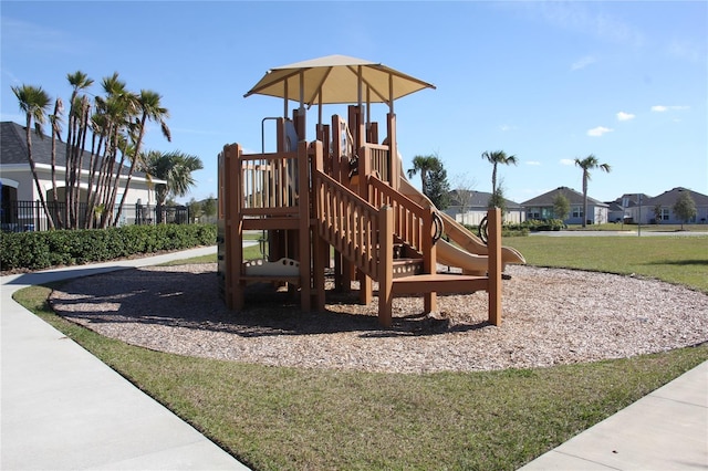 view of jungle gym with a lawn