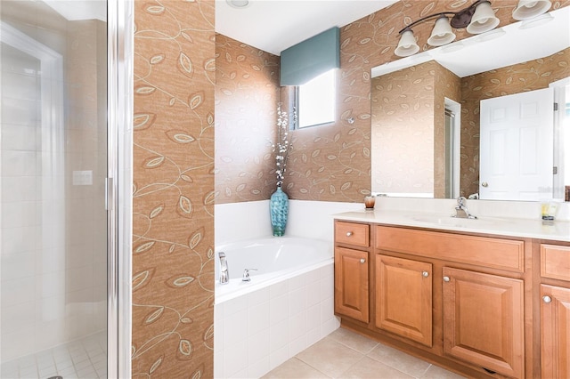 bathroom with vanity, tile patterned floors, and separate shower and tub