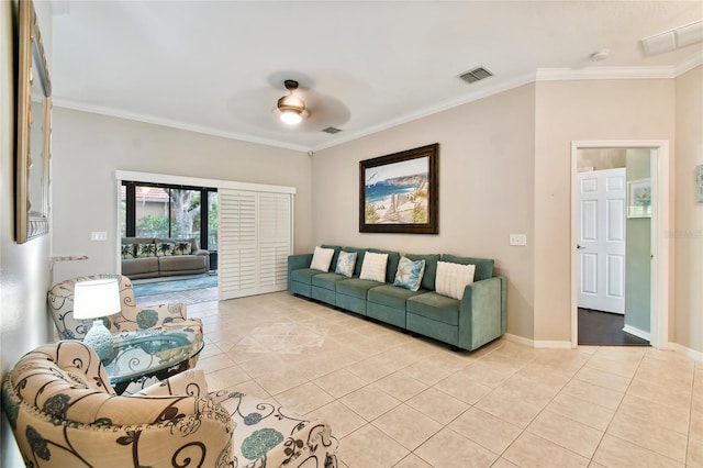 living room featuring crown molding, ceiling fan, and light tile patterned floors