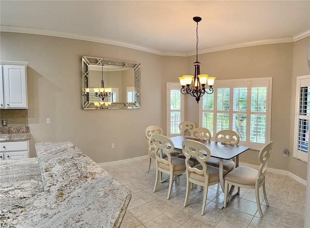 dining room featuring an inviting chandelier, crown molding, and light tile patterned flooring