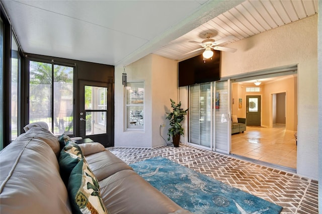 living room with ceiling fan