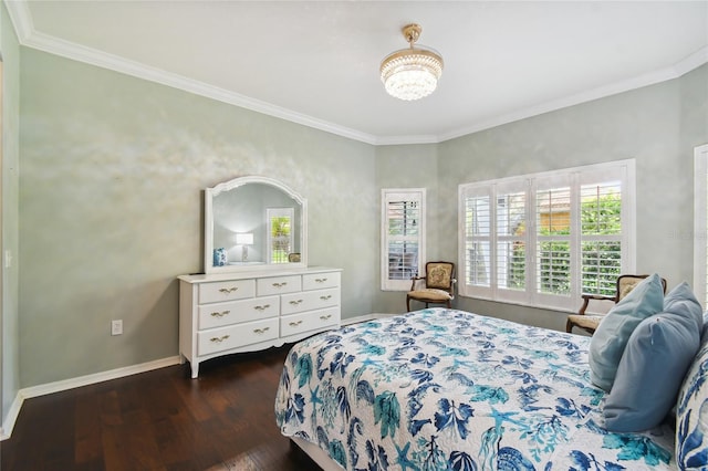 bedroom with ornamental molding and dark hardwood / wood-style floors