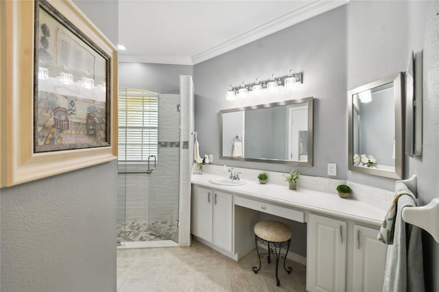 bathroom with crown molding, vanity, tile patterned floors, and walk in shower