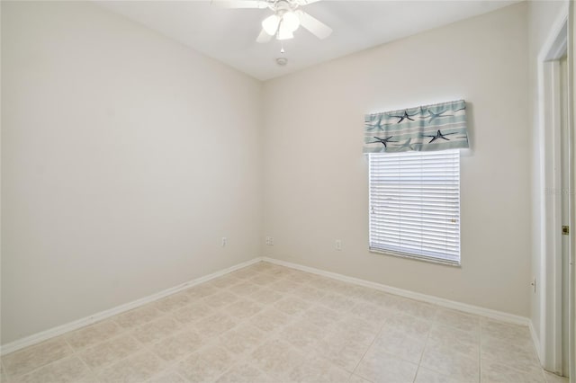 spare room with ceiling fan