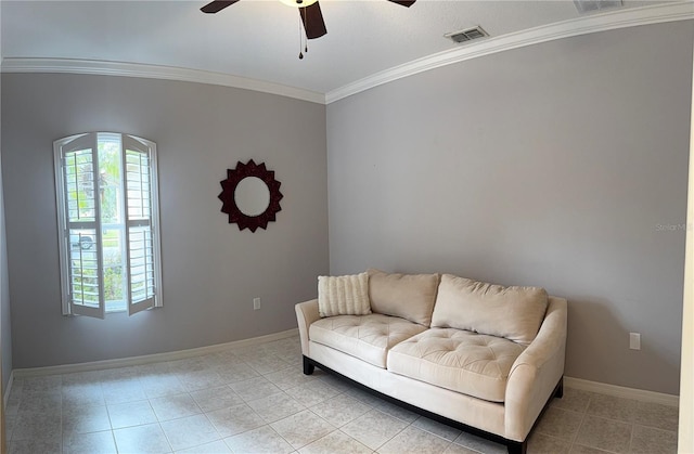 living room featuring ornamental molding, light tile patterned floors, and ceiling fan