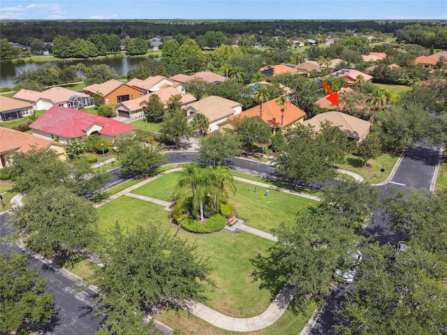 drone / aerial view with a water view