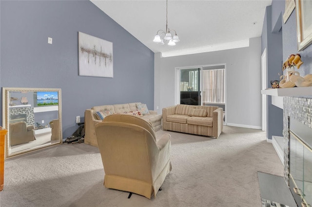 carpeted living room featuring a notable chandelier and high vaulted ceiling