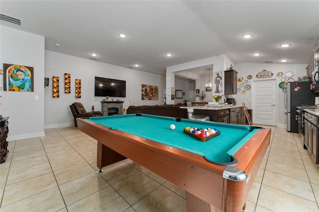 playroom featuring light tile patterned floors and billiards