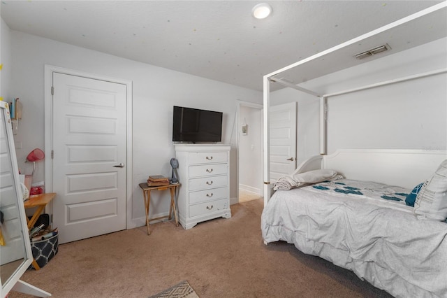 bedroom featuring carpet