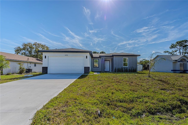 single story home featuring a garage, central AC unit, and a front lawn