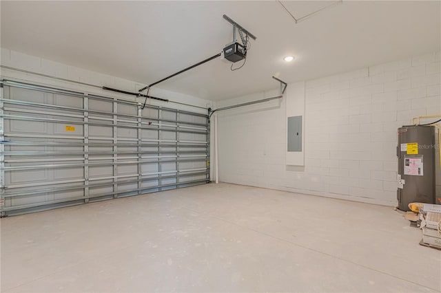 garage featuring a garage door opener, electric panel, and electric water heater