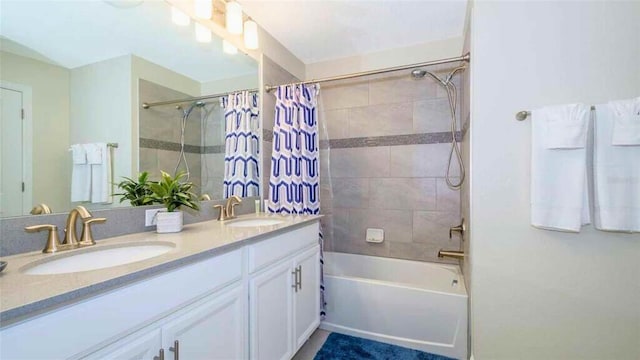 bathroom with vanity and shower / bath combo with shower curtain