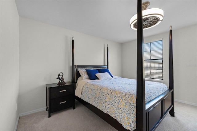 bedroom with light colored carpet