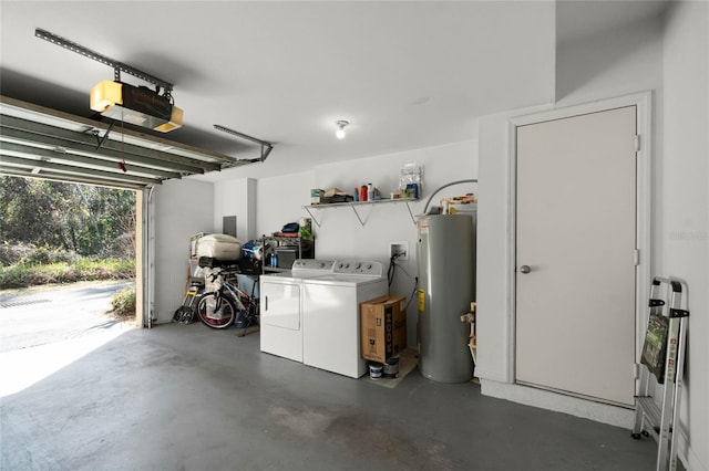 garage with separate washer and dryer, a garage door opener, and electric water heater