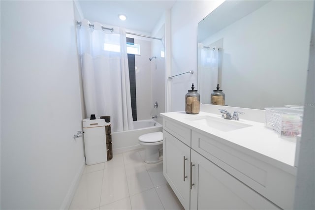 full bathroom with shower / bath combination with curtain, tile patterned floors, toilet, and vanity