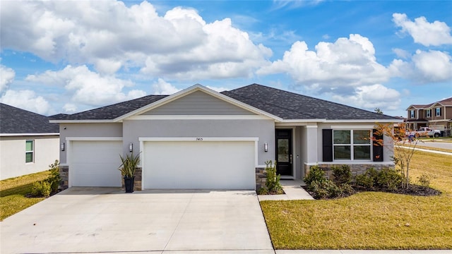 ranch-style home with a garage and a front lawn